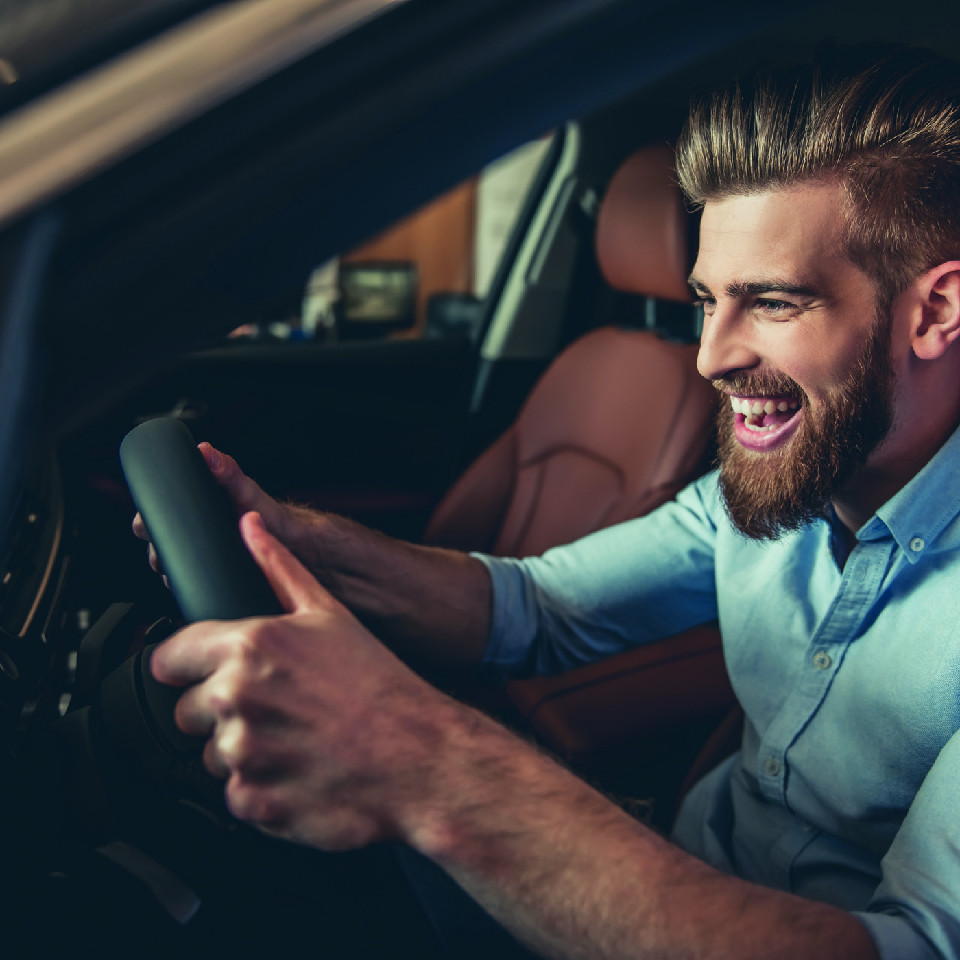Excited man in car