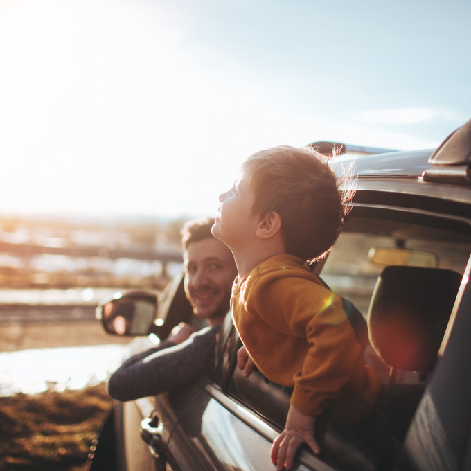 Kid looking out of window