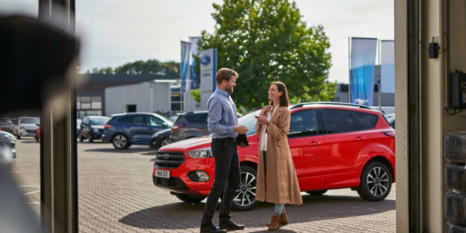 fcsd ford service 2022 kuga red ford economy service customer handover vehicle to service advisor at interactive reception (1)