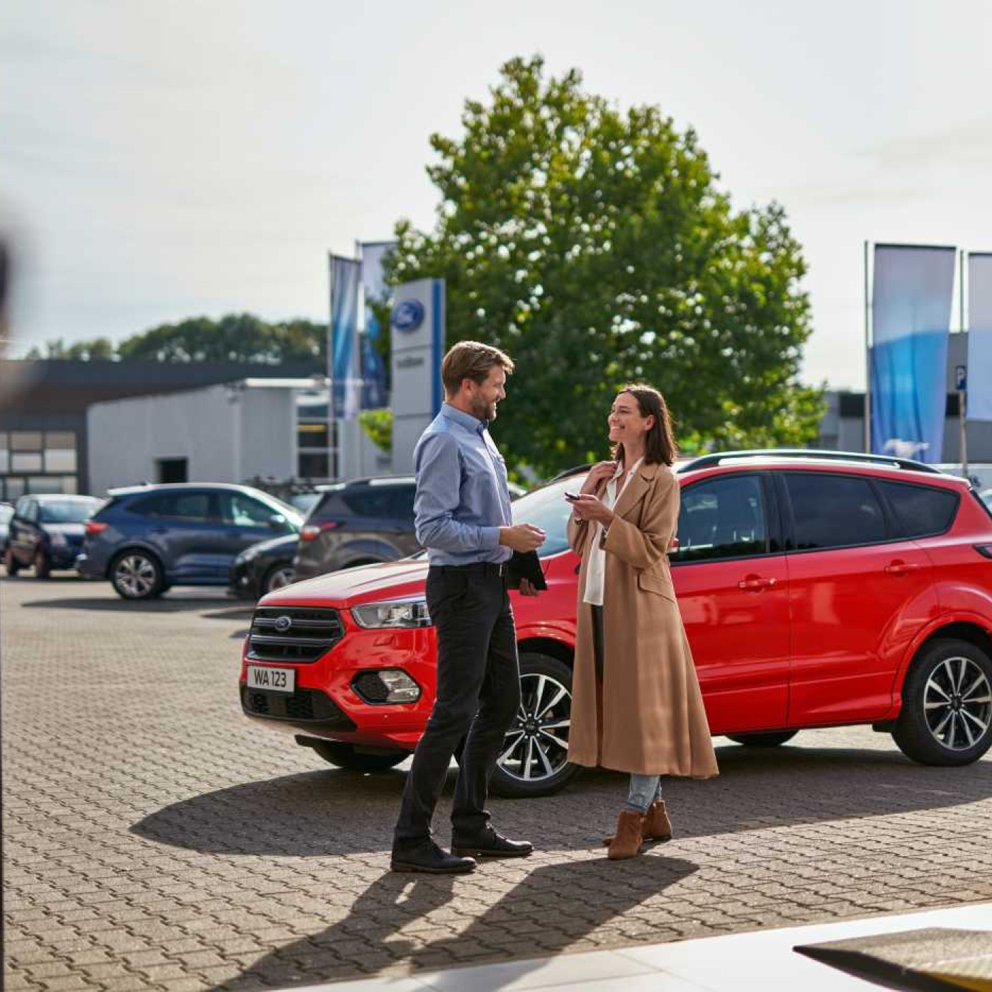 fcsd ford service 2022 kuga red ford economy service customer handover vehicle to service advisor at interactive reception (1)