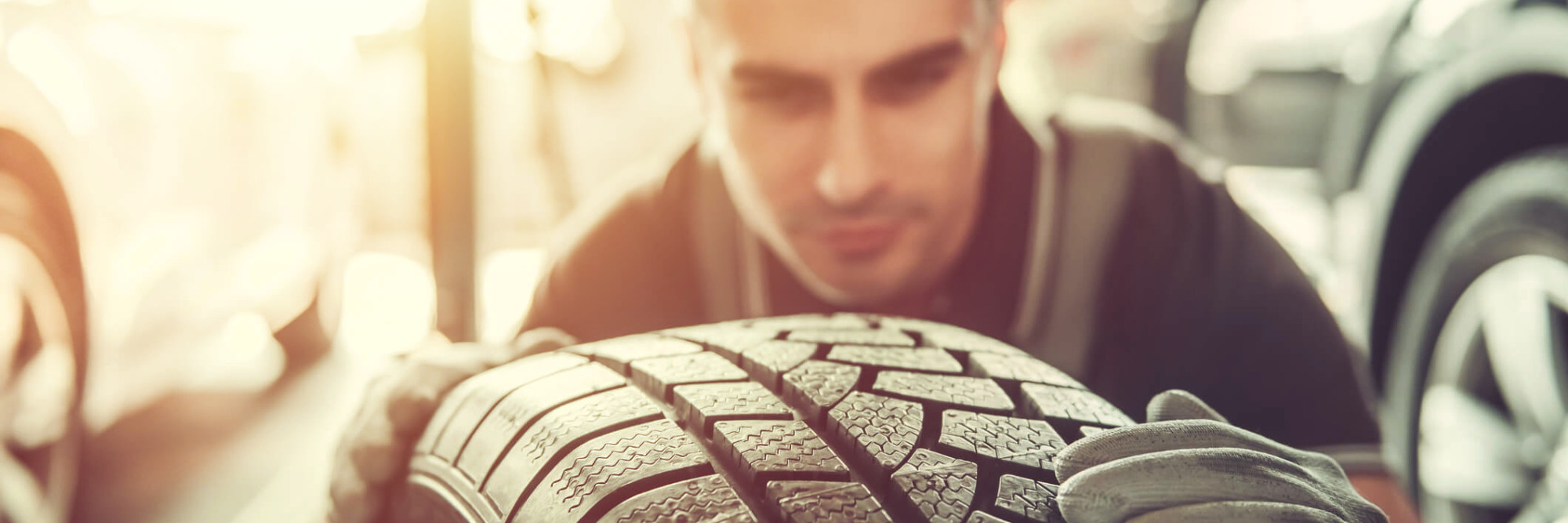 Mechanic checking tire