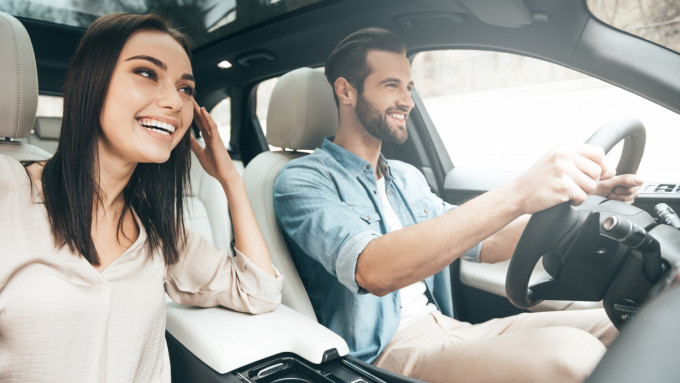 Couple driving in car ResizedImageWzEyMDYsODAzXQ 1