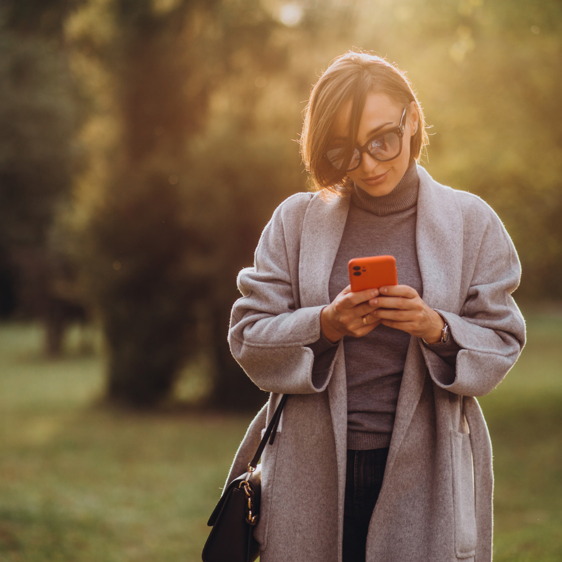 Woman sunglases phone