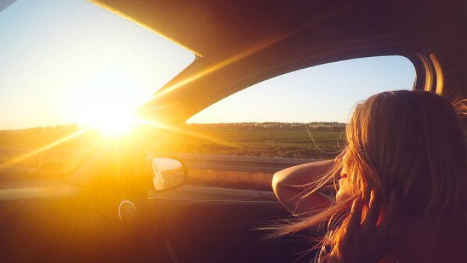 Small Girl in car sundown