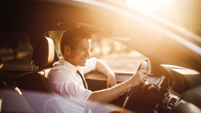 Small Man driving car